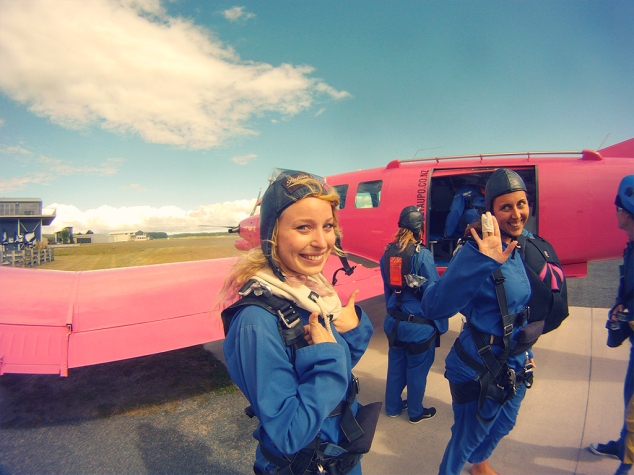 Getting ready to get onto the bright pink plane! 